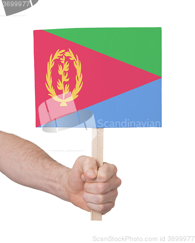 Image of Hand holding small card - Flag of Eritrea