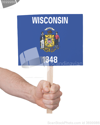 Image of Hand holding small card - Flag of Wisconsin