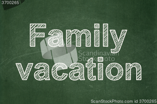 Image of Vacation concept: Family Vacation on chalkboard background
