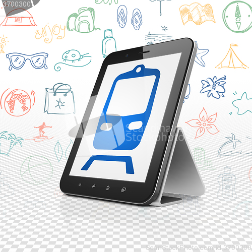 Image of Travel concept: Tablet Computer with Train on display