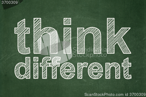 Image of Education concept: Think Different on chalkboard background