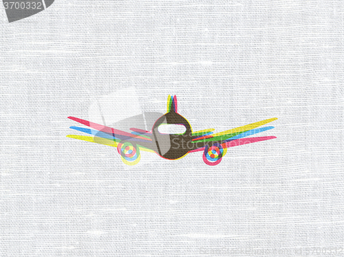 Image of Tourism concept: Aircraft on fabric texture background