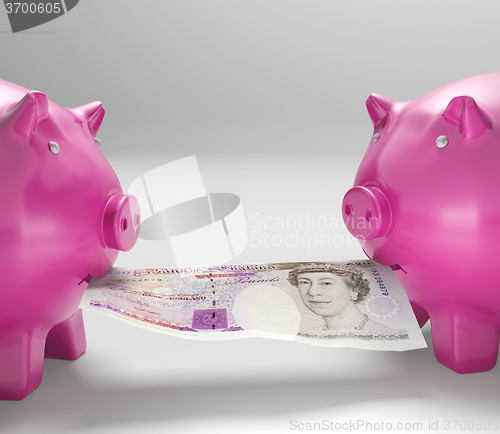 Image of Piggybanks Eating Money Shows Shared Savings