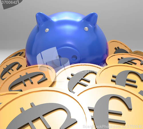 Image of Piggybank Surrounded In Coins Showing European Savings