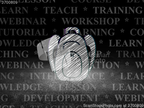 Image of Learning concept: Backpack in grunge dark room