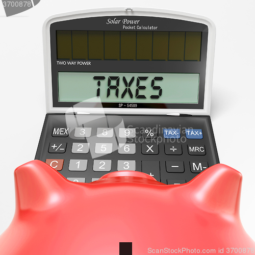 Image of Taxes On Calculator Shows HMRC Return Due