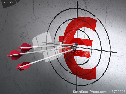 Image of Currency concept: arrows in Euro target on wall background