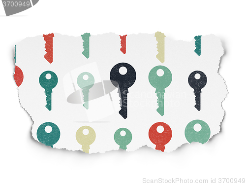 Image of Safety concept: Key icons on Torn Paper background