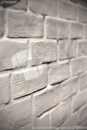 Image of in london abstract    texture of a ancien wall and ruined brick