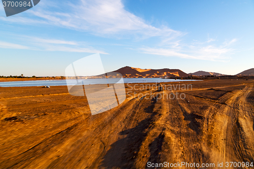 Image of sunshine in  yellow  desert of morocco  