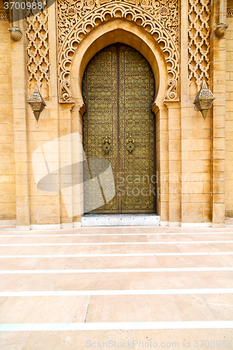 Image of old door in morocco   wall ornate brown