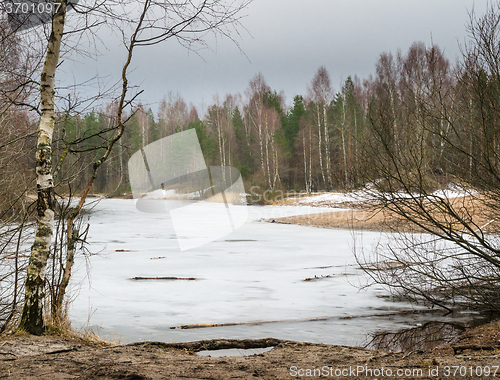 Image of Spring March landscape at wood lake