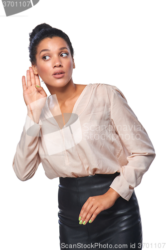 Image of Business woman listening to gossip