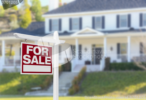 Image of Home For Sale Sign in Front of New House