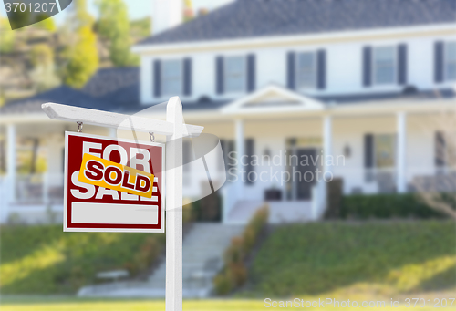 Image of Sold Home For Sale Sign in Front of New House