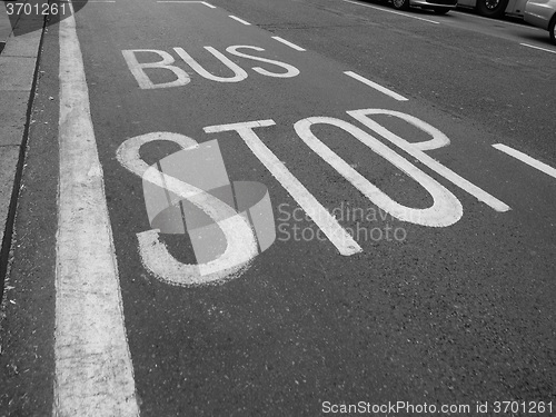 Image of Black and white Bus stop sign