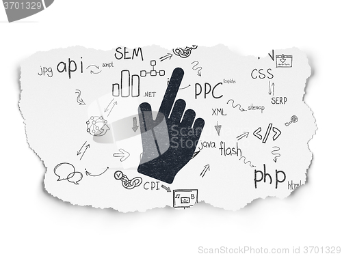 Image of Web development concept: Mouse Cursor on Torn Paper background