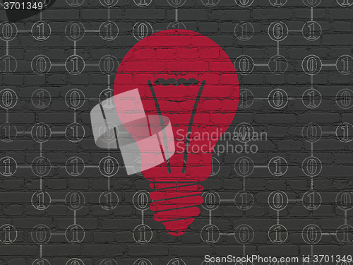 Image of Finance concept: Light Bulb on wall background
