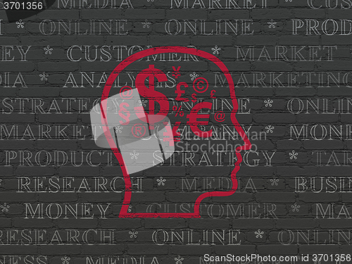 Image of Marketing concept: Head With Finance Symbol on wall background
