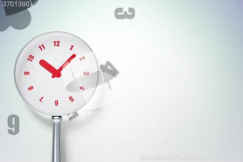 Image of Timeline concept:  Clock with optical glass on digital background