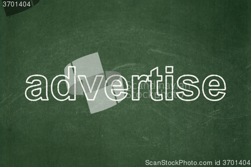 Image of Marketing concept: Advertise on chalkboard background