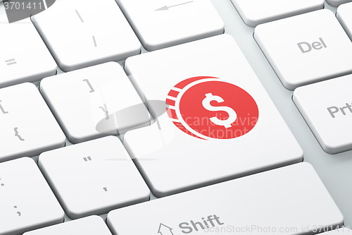 Image of Money concept: Dollar Coin on computer keyboard background