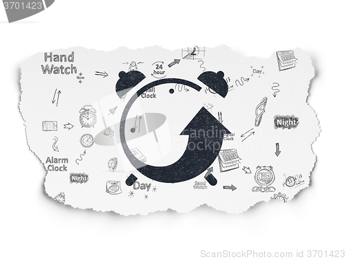 Image of Timeline concept: Alarm Clock on Torn Paper background