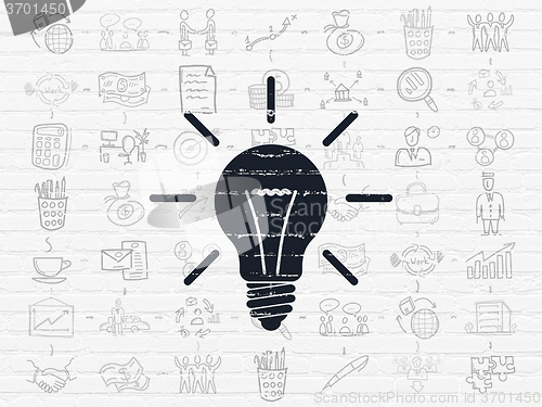 Image of Finance concept: Light Bulb on wall background