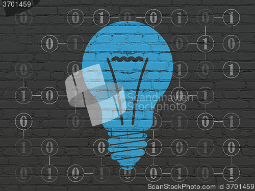 Image of Finance concept: Light Bulb on wall background