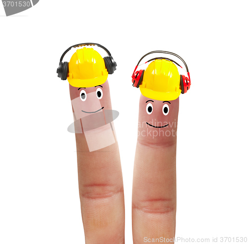 Image of Two fingers in helmet with headphones