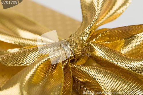 Image of detail of golden ribbon 