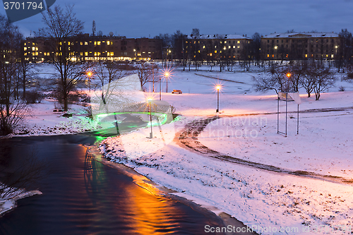 Image of City park in winter evening