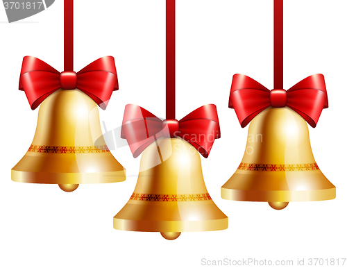 Image of golden bells with a red bow