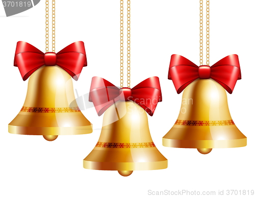 Image of golden bells with a red bow