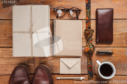 Image of Men\'s accessories on the wooden table