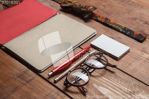 Image of Men\'s accessories on the wooden table