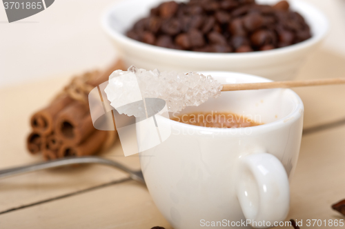 Image of espresso coffee with sugar and spice