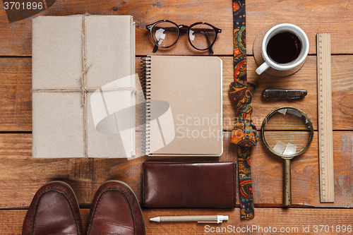 Image of Men\'s accessories on the wooden table