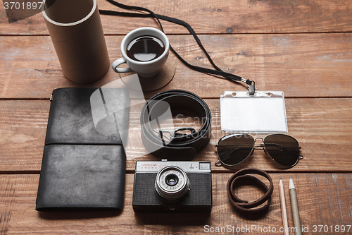 Image of Men\'s accessories on the wooden table