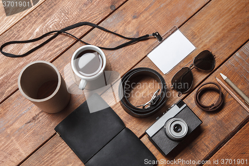 Image of Men\'s accessories on the wooden table