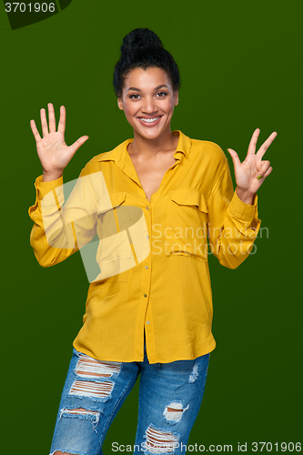 Image of Woman showing eight fingers