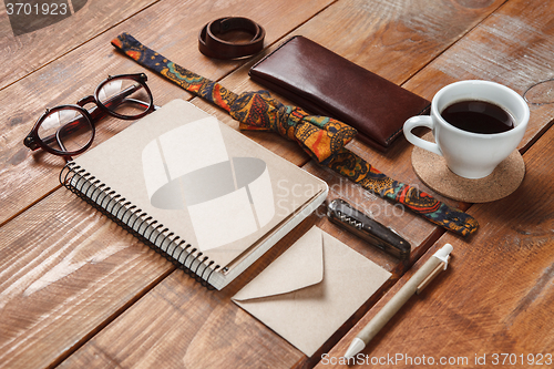 Image of Men\'s accessories on the wooden table