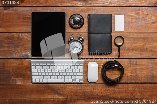 Image of Men\'s accessories on the wooden table