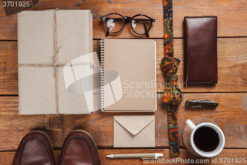 Image of Men\'s accessories on the wooden table