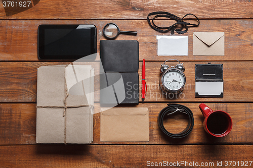 Image of Men\'s accessories on the wooden table