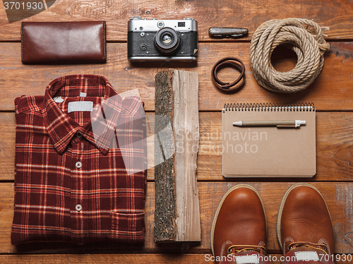 Image of Men\'s accessories on the wooden table