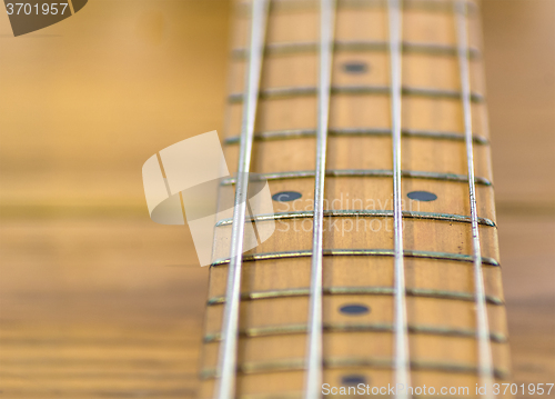 Image of Electric bass fretboard 