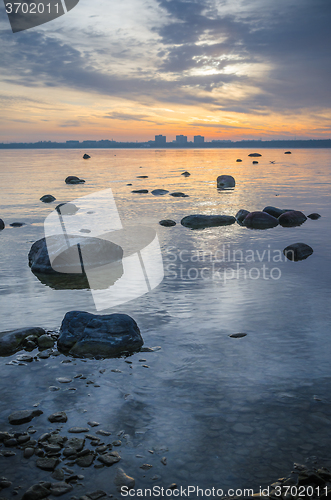 Image of Beautiful sunrise on the sea. Views of Tallinn.