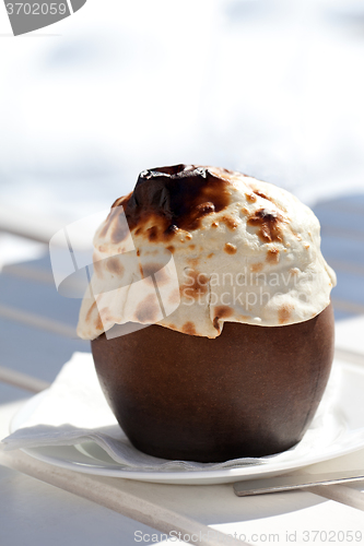 Image of Clay pot covered with bread 