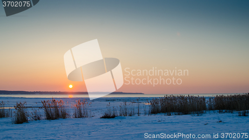 Image of Winter sunset on the sea. The Gulf of Finland